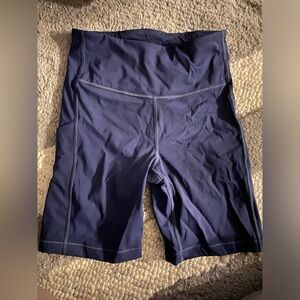 Athleta ultimate stash pocket shorts 7” size: small navy